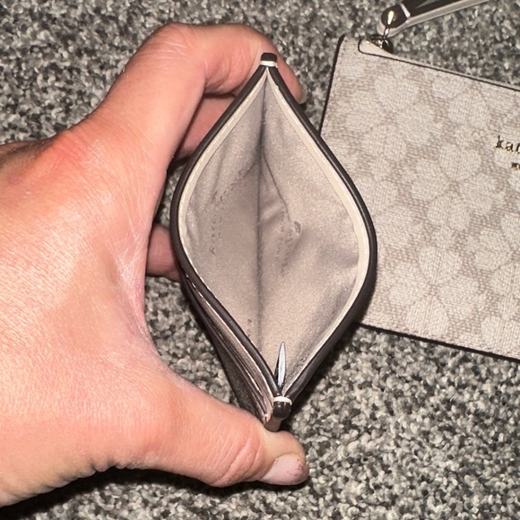 Kate Spade Cream flower logo Wristlet and Card Holder